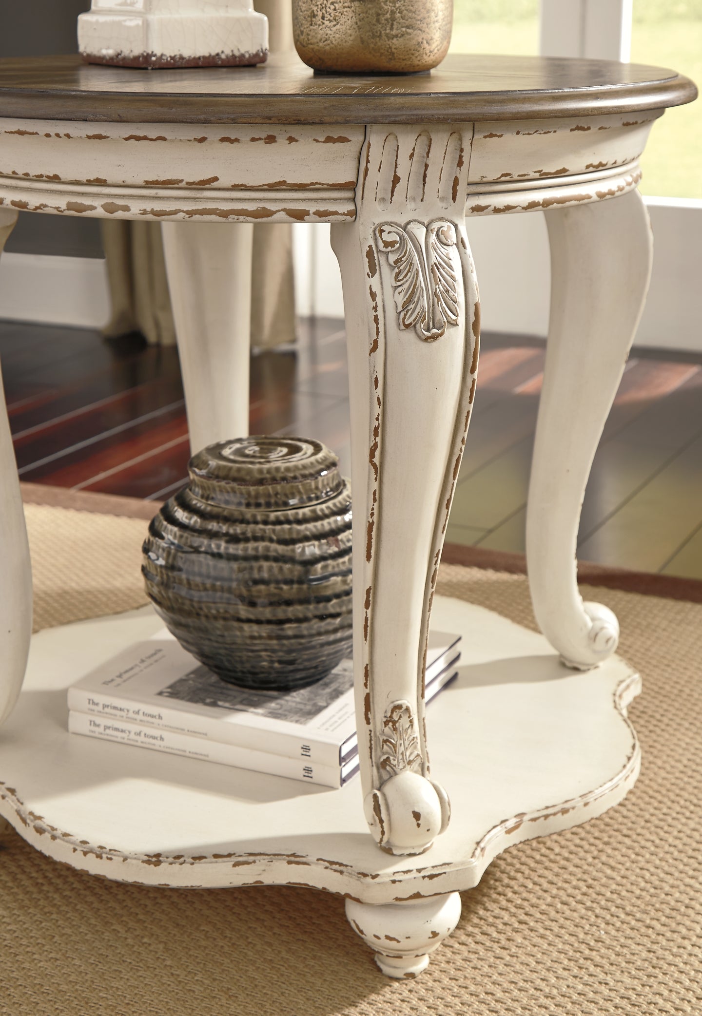 Ashley Express - Realyn Round End Table