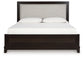 Ashley Express - Neymorton Queen Upholstered Panel Bed with 2 Nightstands